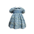 Vestido con Flores Azules Cosmos y Nido de Abeja con Cuello Peter